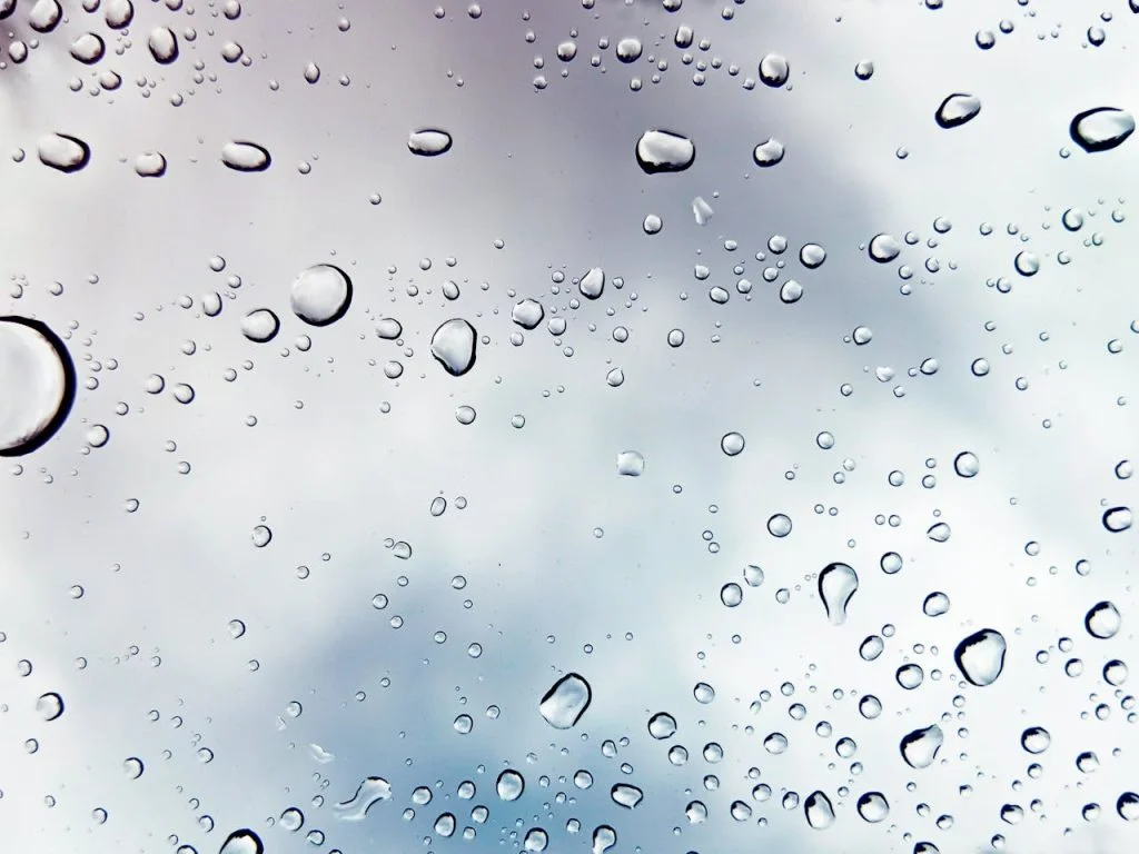Illustrative close-up of water droplets on glass